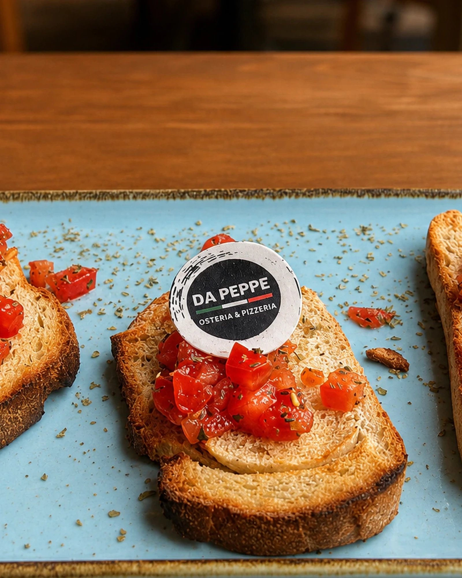 Bruschetta mit Tomaten, Mozzarella und Rucola bei Da Peppe